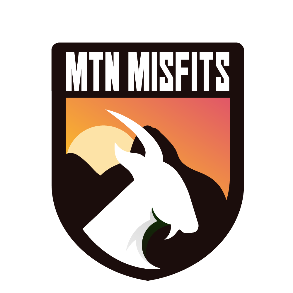 Mountain Misfits badge: a mountain goat against a sunset over peaks